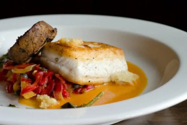 Seared halibut with ratatouille and saffron nage